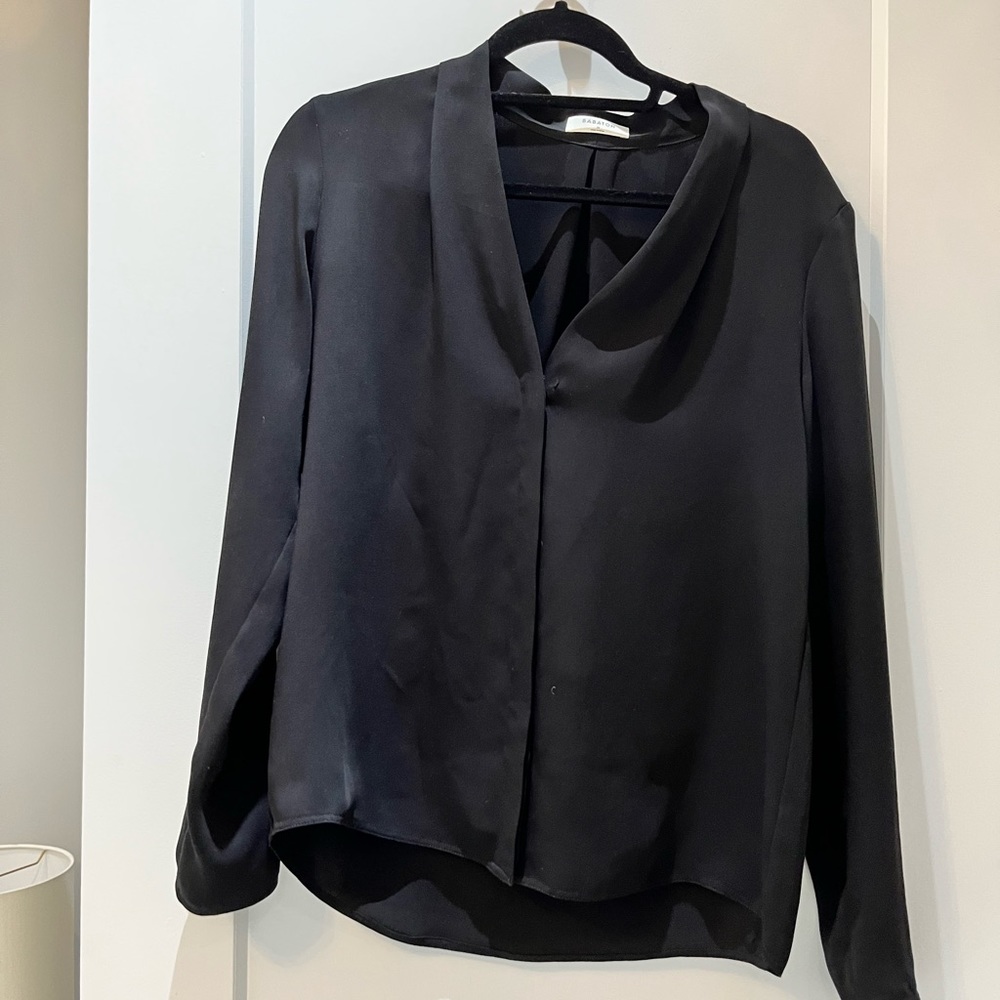 Babaton Power blouse in black. M.